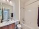 Bathroom with a sink, toilet, and shower-tub combination at 448 Bonanza Dr, Erie, CO 80516