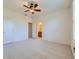 Spacious bedroom with access to an ensuite bathroom, offering comfort and privacy at 448 Bonanza Dr, Erie, CO 80516