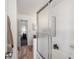 Clean and bright bathroom featuring white tile and shower with glass doors at 6741 S Ivy Way # B4, Centennial, CO 80112