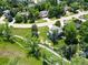 Aerial view of home with mature trees and landscaping with easy access to the LoBo trail at 7999 Centrebridge Dr, Niwot, CO 80503