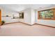 Bright basement with natural light from multiple windows, creating a warm, inviting space at 7999 Centrebridge Dr, Niwot, CO 80503