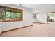 Basement with an open layout, offering versatility and access to a separate dining area at 7999 Centrebridge Dr, Niwot, CO 80503