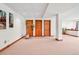 Spacious basement, featuring ample room for activities, three closets, and potential customization at 7999 Centrebridge Dr, Niwot, CO 80503