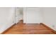 Bedroom featuring wood floors and a double-door closet at 7999 Centrebridge Dr, Niwot, CO 80503