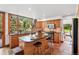 Bright kitchen boasts granite counters, stainless appliances, tile flooring, and a large window with natural light at 7999 Centrebridge Dr, Niwot, CO 80503