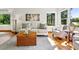 Charming living room with natural light, a cozy sofa, and tasteful decor creating a welcoming atmosphere at 7999 Centrebridge Dr, Niwot, CO 80503