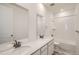 Bathroom with double sinks, modern vanity, and shower over tub at 3157 S Russell St, Morrison, CO 80465