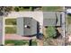 Aerial view of the home showing the roof, backyard, detached garage, and a trampoline at 6981 Zuni St, Denver, CO 80221