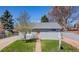 Charming single-story home with a well-manicured lawn and appealing curb appeal at 6981 Zuni St, Denver, CO 80221