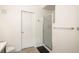 Bathroom featuring a glass-enclosed shower and vanity at 8707 E Florida Ave # 510, Denver, CO 80247