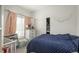 Cozy bedroom with a comfortable bed, closet, and ample natural light at 8707 E Florida Ave # 510, Denver, CO 80247