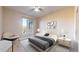 Bright bedroom features a ceiling fan, ample natural light, and neutral tones at 2500 E Cherry Creek South Dr # 213, Denver, CO 80209