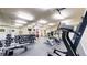 Fully equipped gym features weights, machines, and mirrors, promoting a healthy and active lifestyle for residents at 2500 E Cherry Creek South Dr # 213, Denver, CO 80209