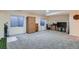 Finished basement with carpet and egress windows at 6776 E Panorama Ln # C1, Denver, CO 80224