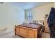 Cozy bedroom with a window and carpet at 6776 E Panorama Ln # C1, Denver, CO 80224