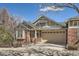 Charming brick home with a well-manicured lawn and attached two-car garage at 6776 E Panorama Ln # C1, Denver, CO 80224