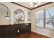 Elegant dining room with wood floors and a view outside at 7526 W Ottawa Pl, Littleton, CO 80128