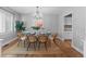 Chic dining room with modern light fixture and stylish dining set, perfect for entertaining at 1366 S Vine St, Denver, CO 80210