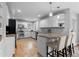 Spacious kitchen with granite countertops, stainless steel appliances, and a breakfast bar with seating at 1366 S Vine St, Denver, CO 80210