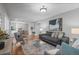 Elegant living room featuring hardwood floors, neutral decor, and comfortable seating at 1366 S Vine St, Denver, CO 80210