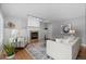 Inviting living room with a fireplace, comfortable seating, and stylish decor at 1366 S Vine St, Denver, CO 80210