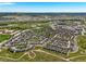 Expansive aerial view of the neighborhood, open space, and highway access at 4378 Fell Mist Way, Castle Rock, CO 80109