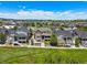 Beautiful aerial view of a two-story home nestled in a neighborhood with mountain views in the distance at 4378 Fell Mist Way, Castle Rock, CO 80109