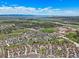 Expansive aerial view of the neighborhood, open space, mountains in the distance, and more at 4378 Fell Mist Way, Castle Rock, CO 80109