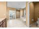 Spacious bathroom connecting the bedroom with large tub and shower at 4378 Fell Mist Way, Castle Rock, CO 80109