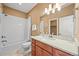 Full bathroom with vanity, subway-tile shower, and natural lighting at 4378 Fell Mist Way, Castle Rock, CO 80109