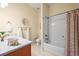 Well-lit bathroom featuring a tub-shower, stylish vanity, and neutral tones at 4378 Fell Mist Way, Castle Rock, CO 80109