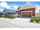 Charming two-story home with a two-car garage, fenced yard, and inviting front porch perfect for relaxing at 4378 Fell Mist Way, Castle Rock, CO 80109