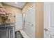 Functional laundry room with washer/dryer and direct access to the walk-in closet at 4378 Fell Mist Way, Castle Rock, CO 80109