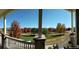 Scenic view from the porch showcases the neighborhood park and colorful autumn trees at 4378 Fell Mist Way, Castle Rock, CO 80109