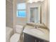 Clean bathroom featuring modern fixtures, a large mirror, and a shower-tub combo at 11267 Central Ct, Broomfield, CO 80021