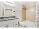 Bathroom with granite countertops, vanity, toilet, and tiled tub/shower at 875 E 78Th Ave # 52, Denver, CO 80229
