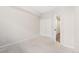 Bedroom with double door closet and hallway access at 875 E 78Th Ave # 52, Denver, CO 80229