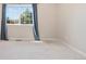 Bedroom with large window and neutral walls and carpet at 875 E 78Th Ave # 52, Denver, CO 80229