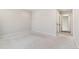 Bedroom with neutral walls, carpet, and access to the hallway at 875 E 78Th Ave # 52, Denver, CO 80229