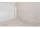 Bedroom features neutral carpet, an open doorway, and closet with folding doors at 875 E 78Th Ave # 52, Denver, CO 80229
