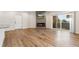 Open floor plan showcases living area, balcony access, and modern fireplace at 875 E 78Th Ave # 52, Denver, CO 80229
