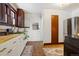 Updated kitchen with butcher block countertops and stainless steel appliances at 202 Lower Glenway St, Palmer Lake, CO 80133