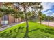 Landscaped yard provides green space along the side of the property at 7755 E Quincy Ave # 104A6, Denver, CO 80237