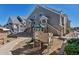 Playground area in a residential area with play equipment, surrounded by tidy landscaping and walking path at 1841 S Dunkirk St # 101, Aurora, CO 80017