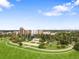 Scenic aerial view of city skyline, green park, and vibrant blue sky at 1375 N Williams St # 206, Denver, CO 80218