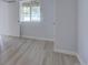 Finished basement with light flooring, recessed lighting, and a window with backyard views at 2253 E 100Th Pl, Thornton, CO 80229
