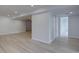 Finished basement with light flooring, recessed lights, and bathroom access with shower at 2253 E 100Th Pl, Thornton, CO 80229