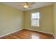Bright bedroom with hardwood floors and a window at 2253 E 100Th Pl, Thornton, CO 80229