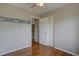 Bright bedroom features hardwood floors, fun decor, and a closet with folding doors at 2253 E 100Th Pl, Thornton, CO 80229