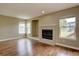 Inviting living room featuring a fireplace and hardwood floors at 2253 E 100Th Pl, Thornton, CO 80229